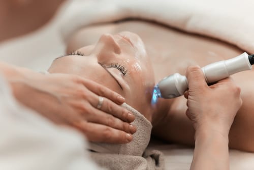 Woman Getting Laser Treatment on Face