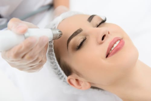 woman getting laser therapy at spa salon-img-blog