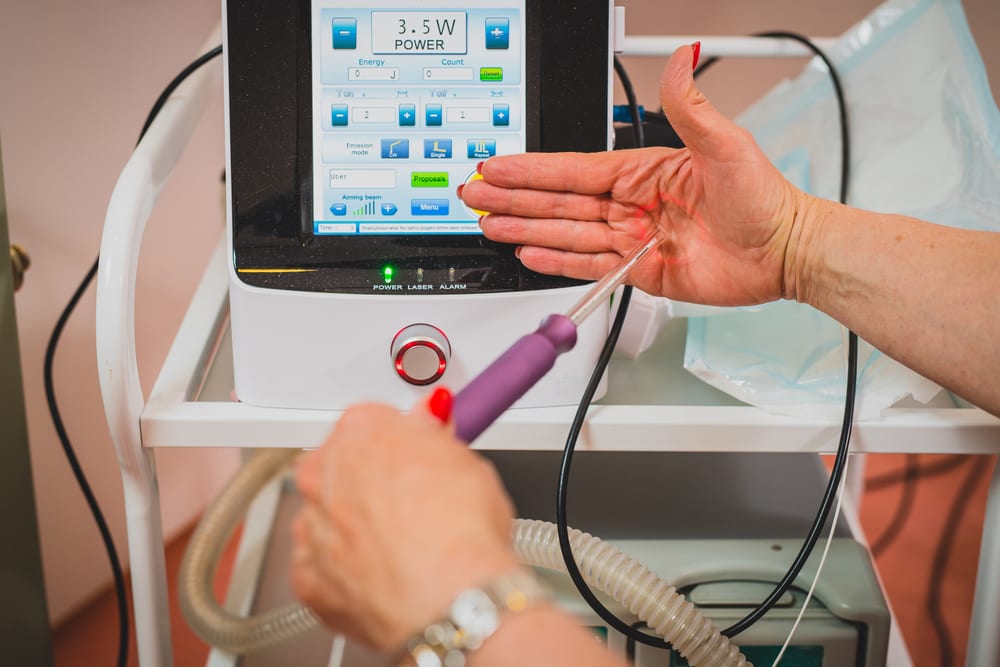 doctor testing vaginal laser for vaginal rejuvenation