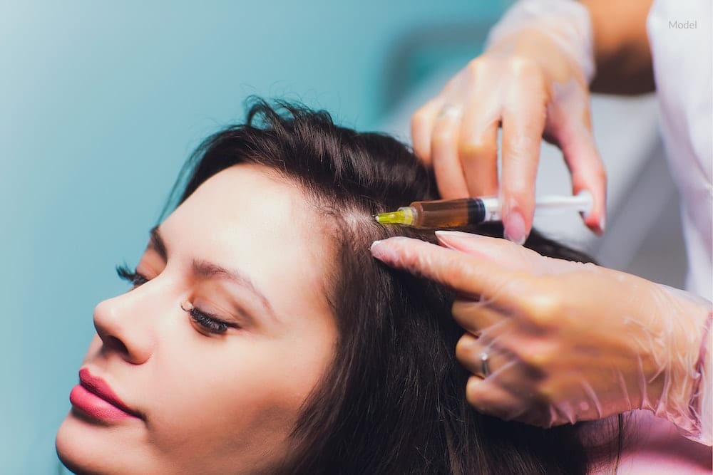 A woman undergoing a PRP treatment for hair loss.