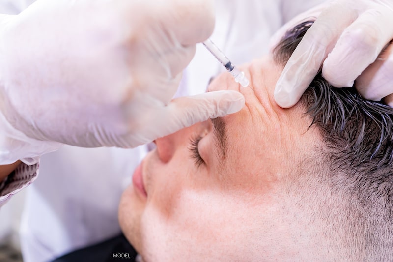 Man receiving BOTOX® Cosmetic treatment.